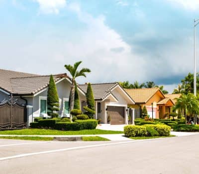Set of Florida modern luxury houses in a residential neighborhood area.